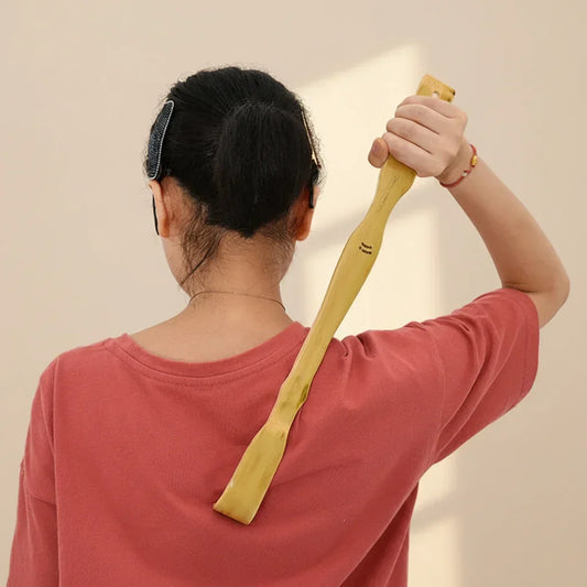 Auto-masseur dos en bambou pour soulager tensions dorsales et lombaires naturellement