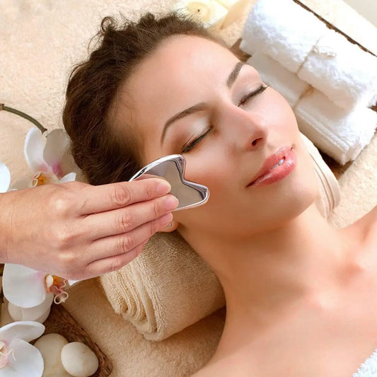 "Grattoir Gua Sha acier inoxydable massage facial professionnel"